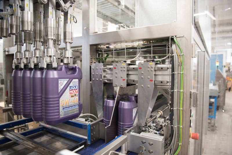 LIQUI MOLY. Oil bottle fill line.